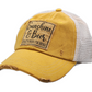 Vintage Distressed Trucker Cap - "Sunshine and Beer That's Why I'm Here"  These distressed beer hats are incredibly comfortable.  Most trucker caps are rigid, but these vintage unstructured caps are made of a cotton/polyester blend with a soft mesh back that makes them fit more like a "Dad Hat."  Now in Canada.