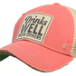Vintage Distressed Trucker Cap - "Drinks Well with Others" - Pink These distressed beer hats are incredibly comfortable.  Most trucker caps are rigid, but these vintage unstructured caps are made of a cotton/polyester blend with a soft mesh back that makes them fit more like a "Dad Hat." Now in Canada.