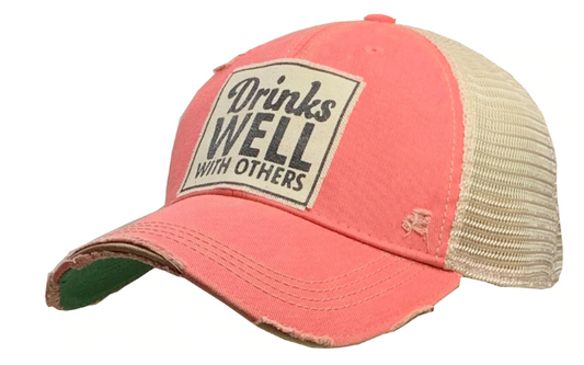 Vintage Distressed Trucker Cap - "Drinks Well with Others" - Pink These distressed beer hats are incredibly comfortable. Most trucker caps are rigid, but these vintage unstructured caps are made of a cotton/polyester blend with a soft mesh back that makes them fit more like a "Dad Hat." Now in Canada.